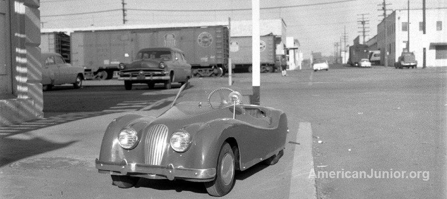 Jaguar XKE 120 outside the American Junior Aircraft Company in Portland, Oregon around 1955